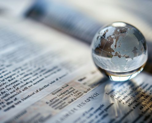 Focused shot of a legal document outlining international complia