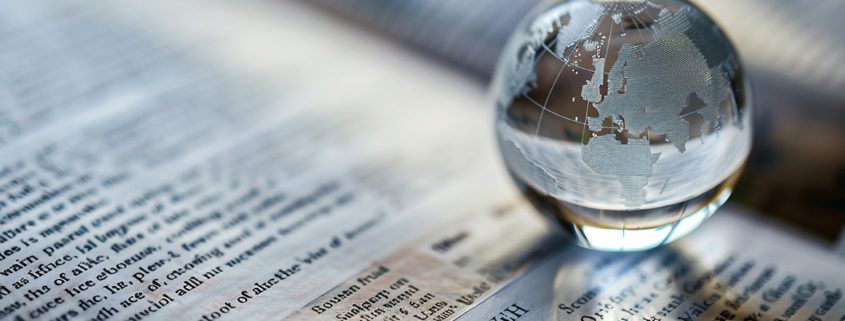 Focused shot of a legal document outlining international complia